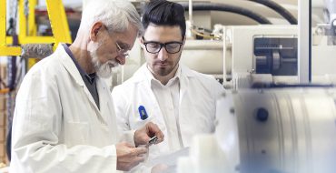 lab scientists reviewing bio samples